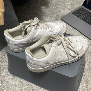 Well worn low court nikes size 7